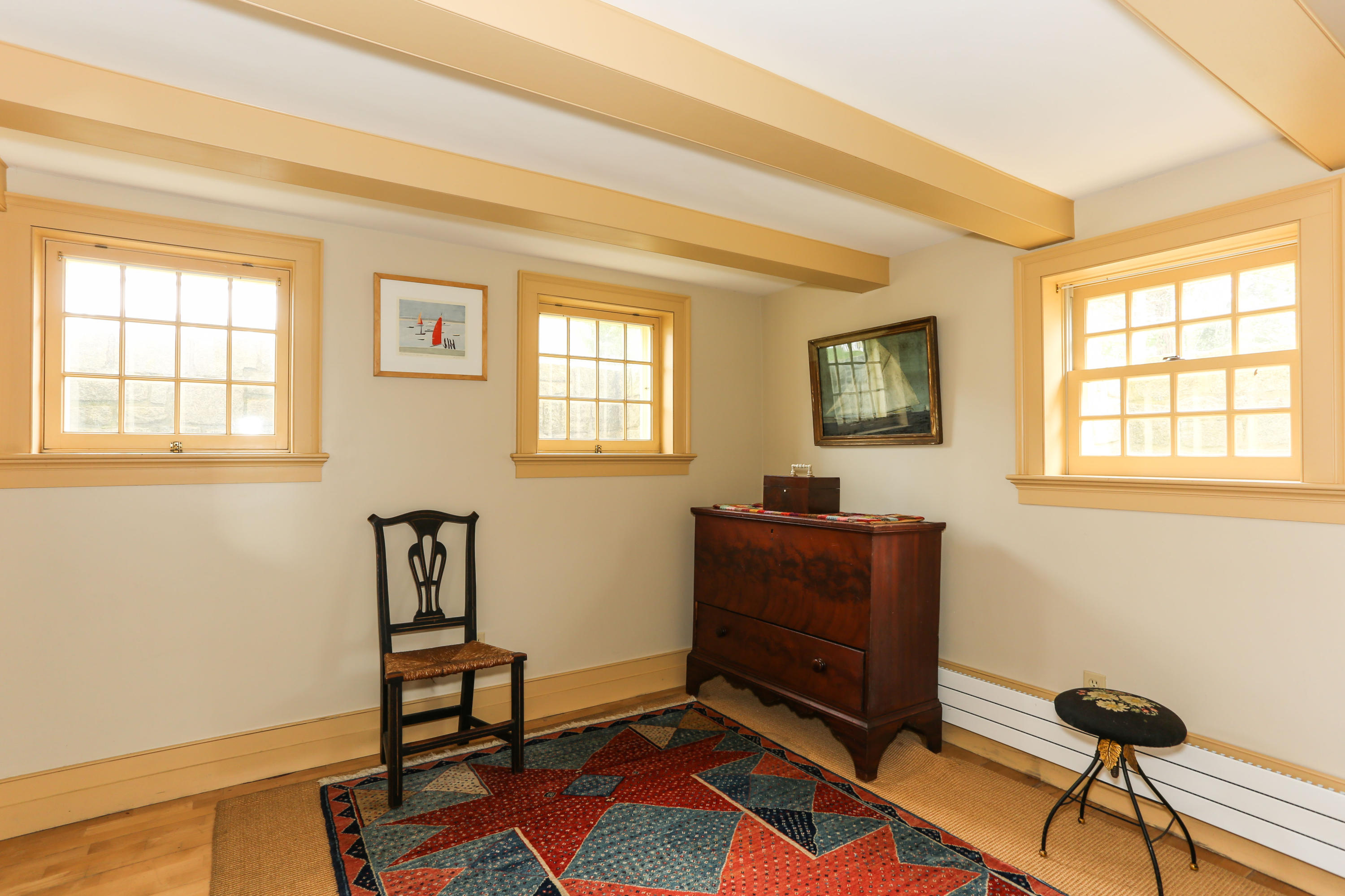 11-15 Franklin Street Provincetown, MA 02657 - Photo 20 of 26 a living room with furniture and a window