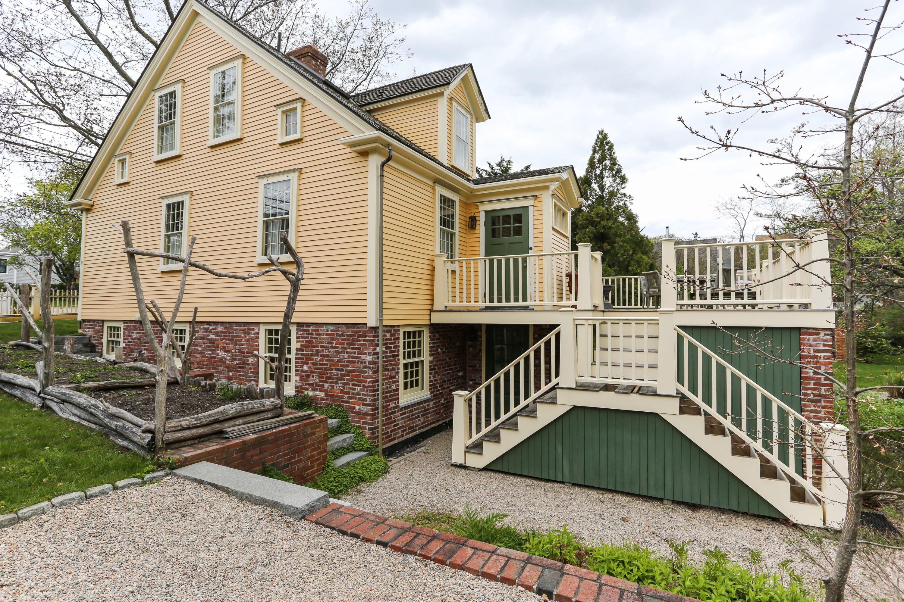 11-15 Franklin Street Provincetown, MA 02657 - Photo 24 of 26 front view of a house with a small yard