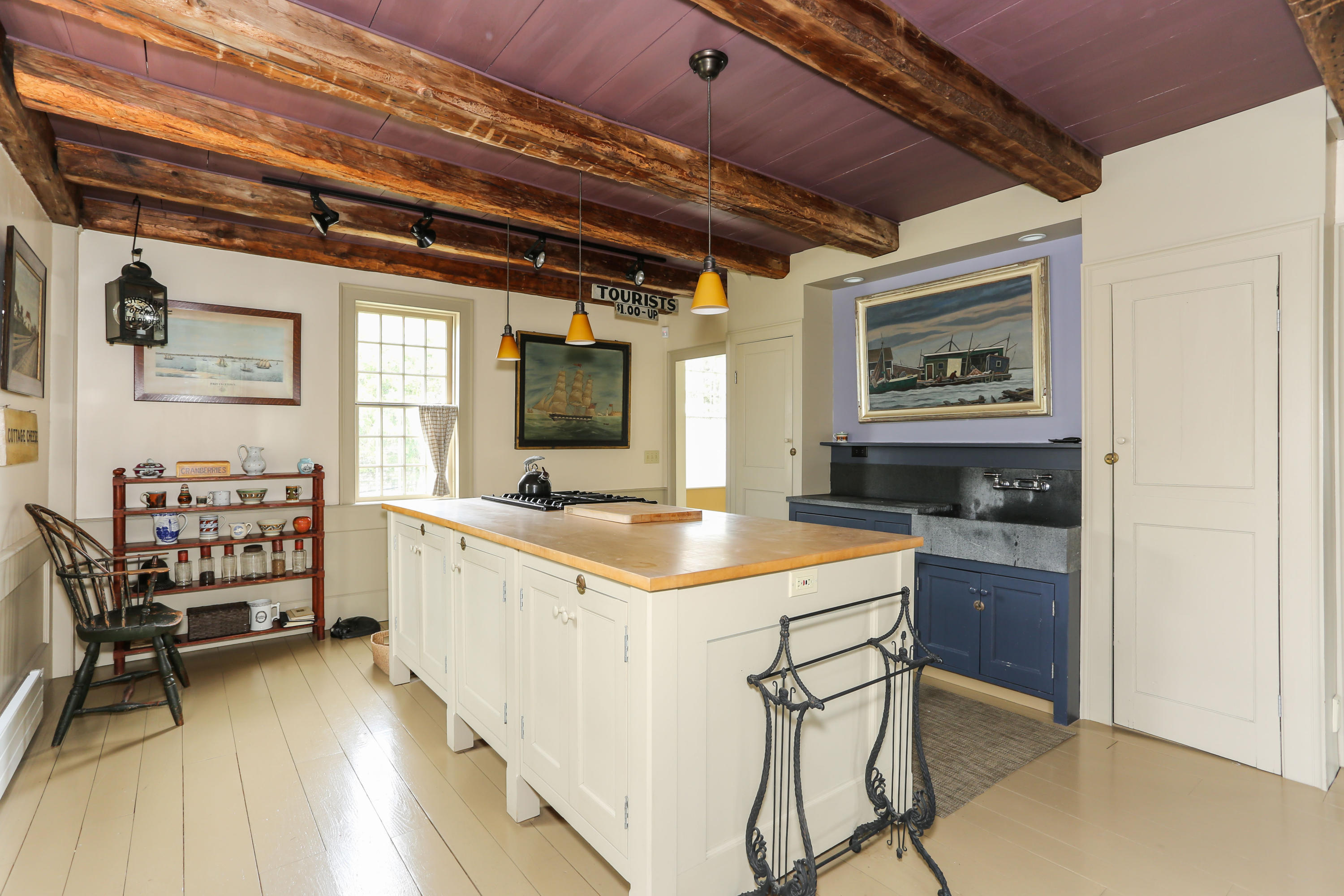 11-15 Franklin Street Provincetown, MA 02657 - Photo 4 of 26 a kitchen that has a cabinets and a stove