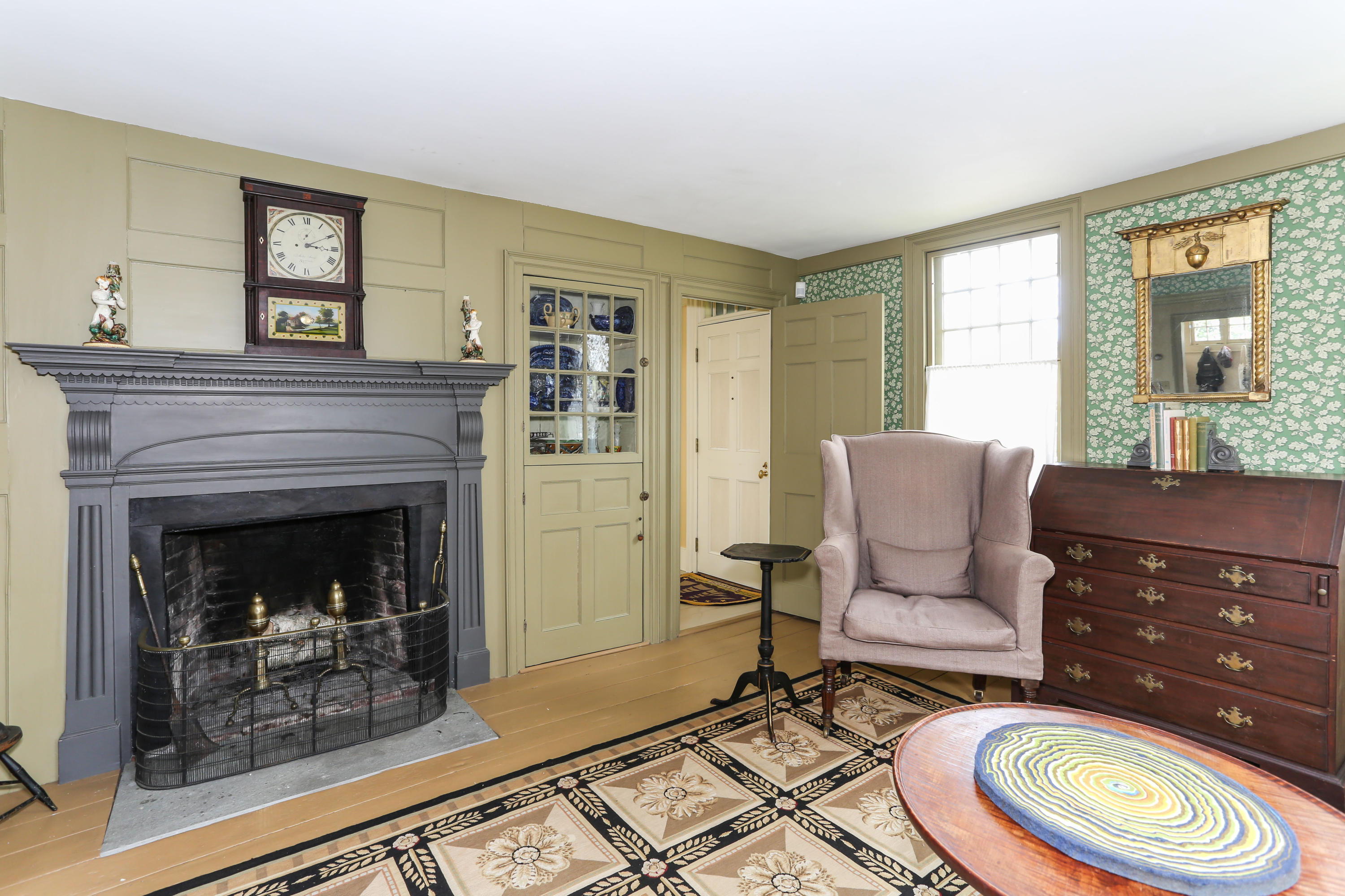 11-15 Franklin Street Provincetown, MA 02657 - Photo 10 of 26 a living room with a couch and a fireplace