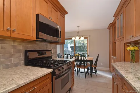a kitchen with a stove and a microwave