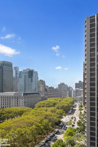 a view of a city with tall buildings