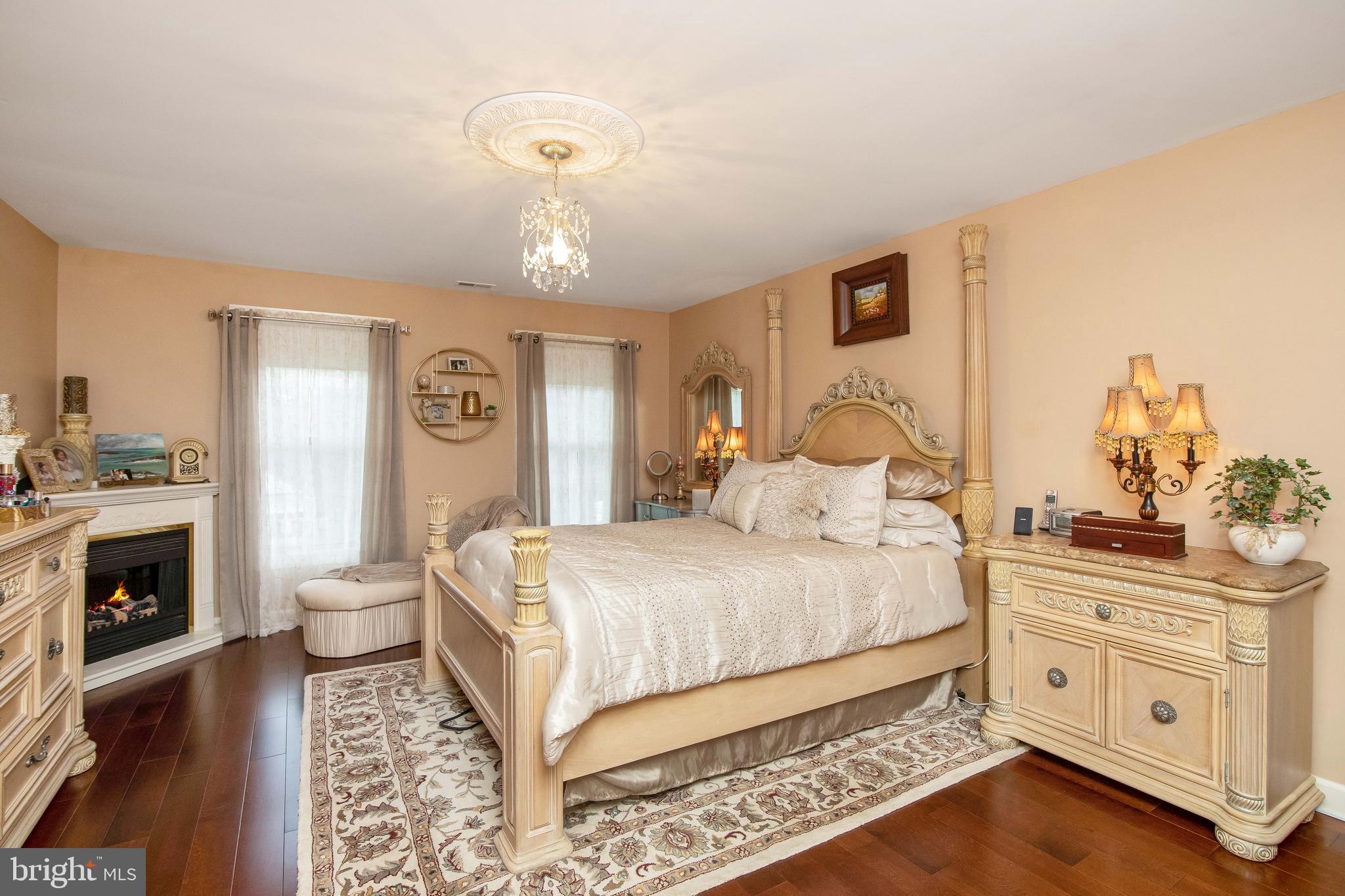 40 Covington Lane Voorhees, NJ 08043 - Photo 21 of 57 Main bdrm w/ electric fireplace & hardwood floors