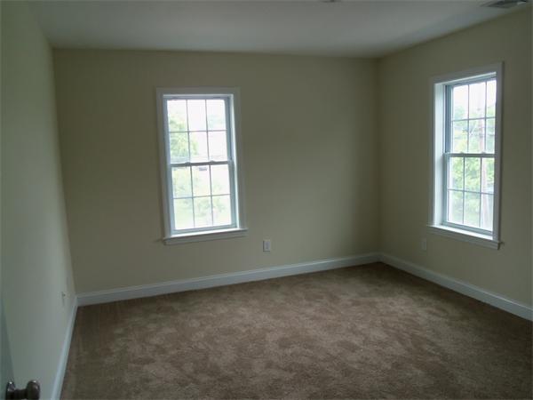 8 Reeves Street Fall River, MA 02721 - Photo 11 of 13 an empty room with a window
