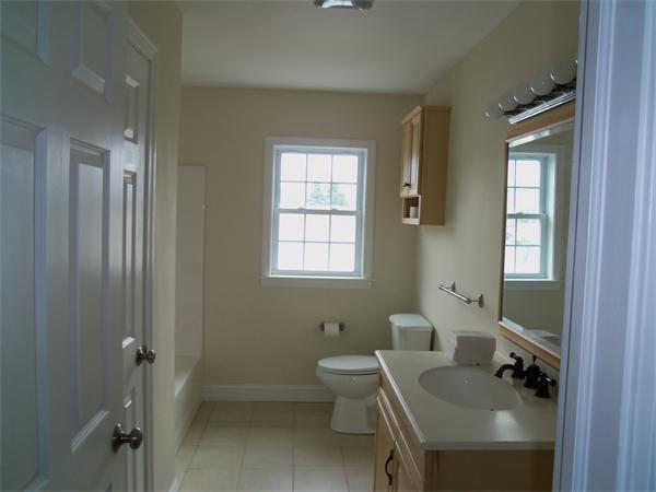 8 Reeves Street Fall River, MA 02721 - Photo 8 of 13 a bathroom with a sink toilet and shower