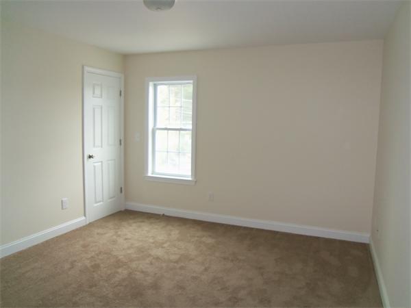 8 Reeves Street Fall River, MA 02721 - Photo 10 of 13 an empty room with a window