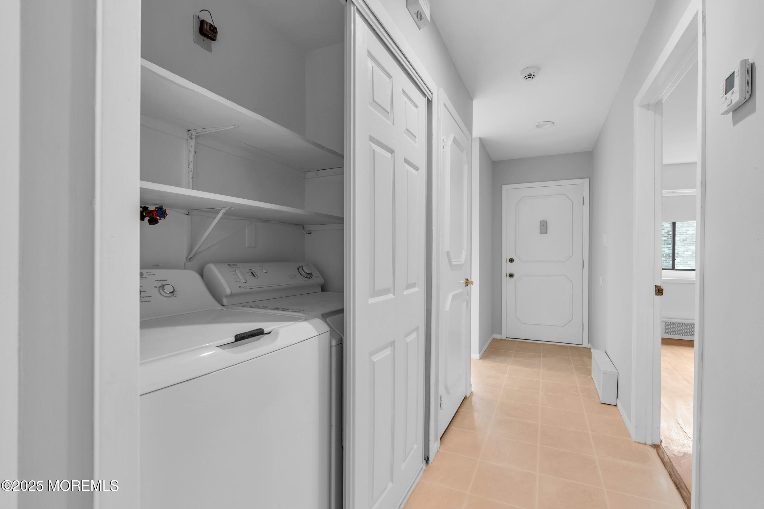 70 Overlook Way, Unit A Manalapan, NJ 07726 - Photo 9 of 20 a view of a hallway with closet