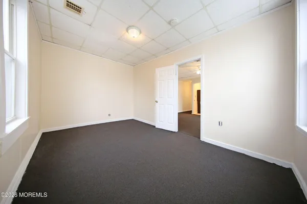 an empty room with an entryway