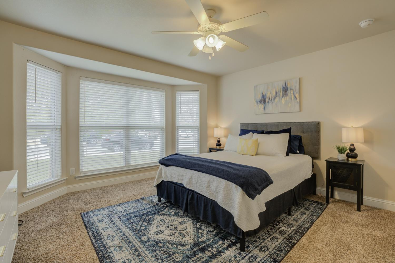 3605 Ridgely Lubbock, TX 79407 - Photo 25 of 36 a spacious bedroom with a large bed and a window
