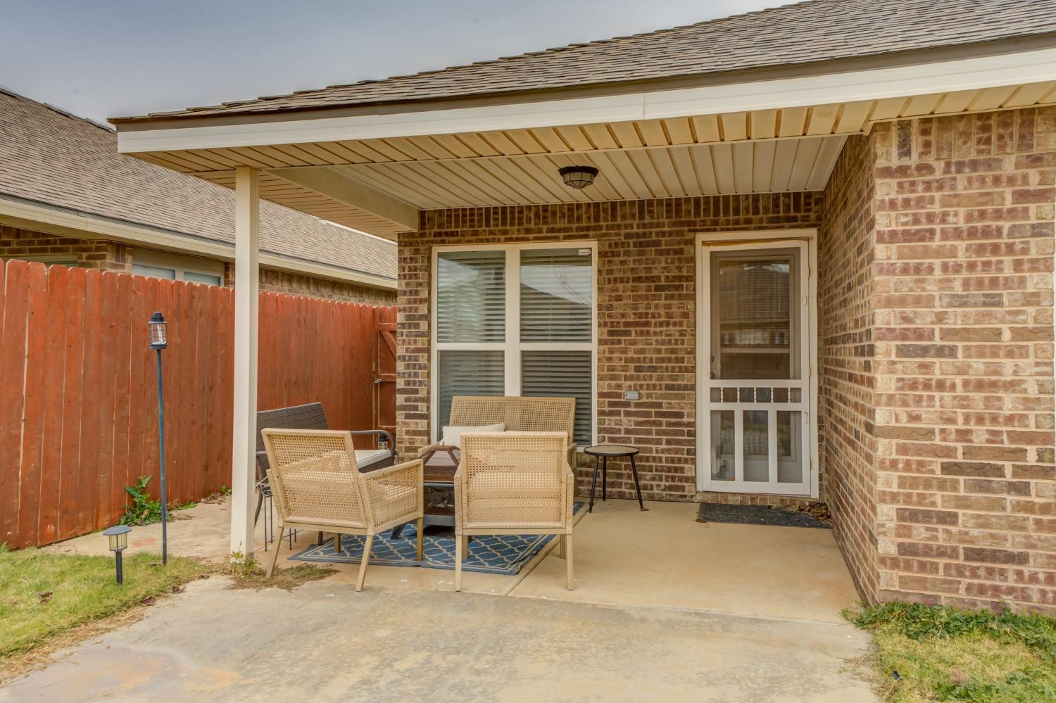3605 Ridgely Lubbock, TX 79407 - Photo 34 of 36 a balcony with table and chairs