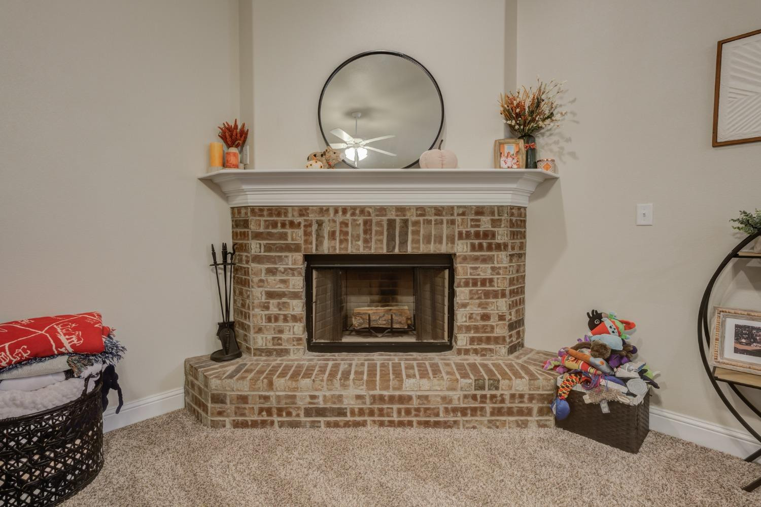 3605 Ridgely Lubbock, TX 79407 - Photo 8 of 36 a living room with furniture and a fireplace