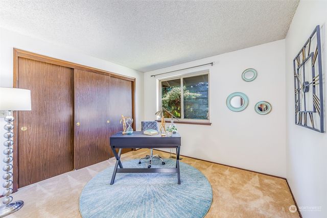 a living room with furniture and a gate