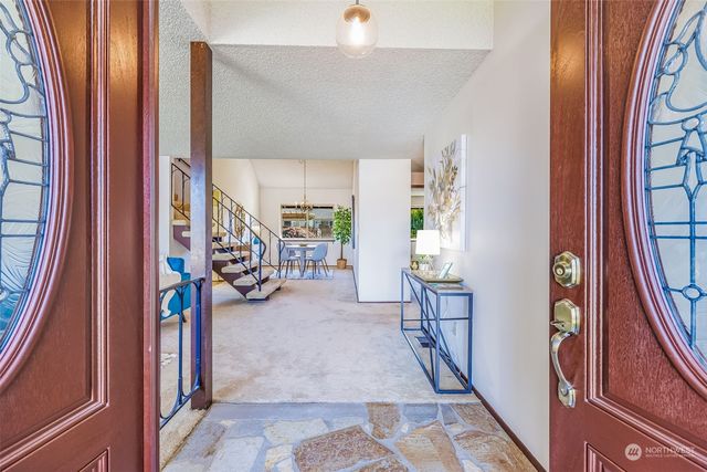 a view of an entryway with furniture