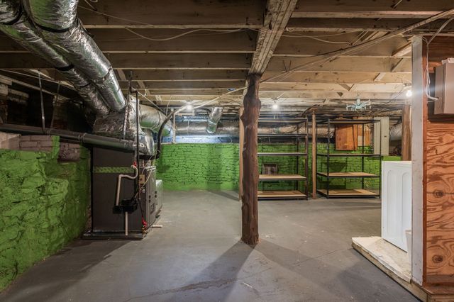 a view of a garage with an outdoor space