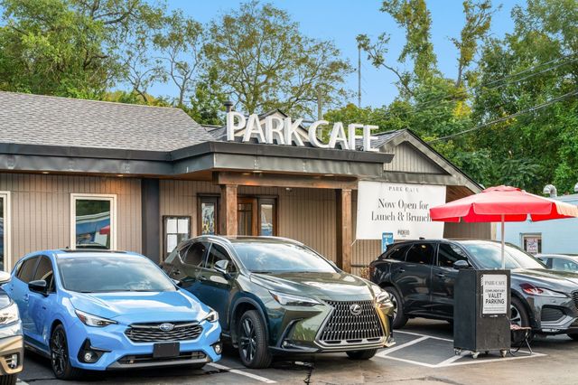 a view of a walk in front of house
