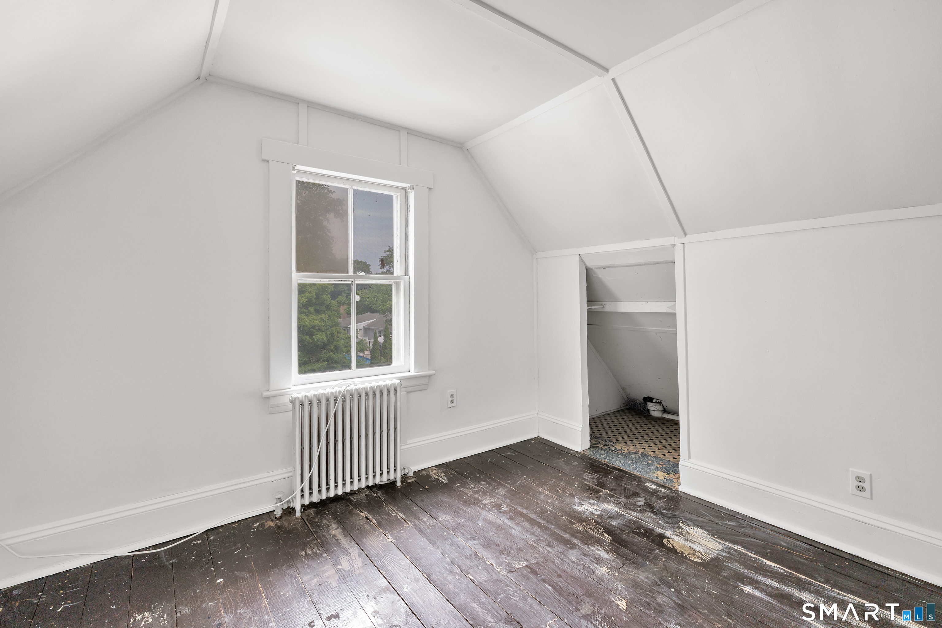1326 Huntington Road Stratford, CT 06614 - Photo 30 of 37 3rd Bedroom is located in the Walk up Attic - Freshly painted and has original wooden floors