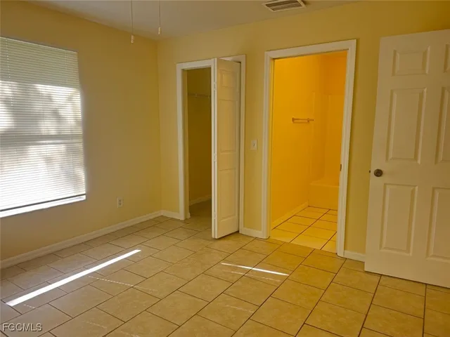 a view of a room with windows