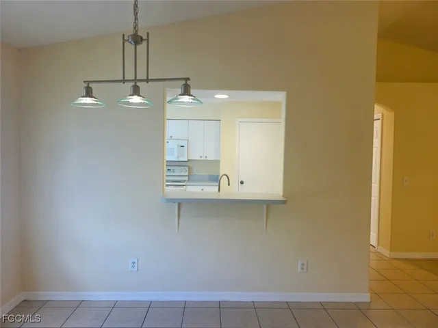 a view of a kitchen with a sink