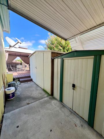 a balcony with wooden floor