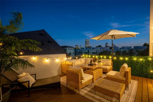 a view of a patio with swimming pool