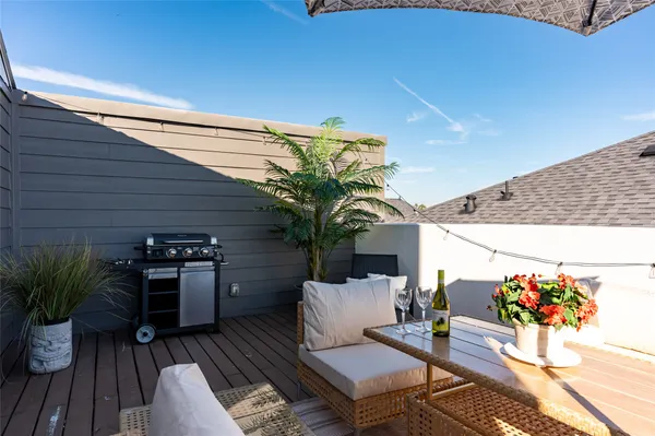 a view of a chairs and table in the patio