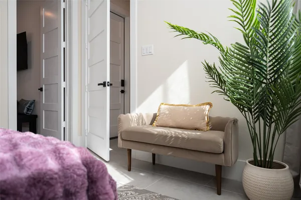 a bedroom with a bed and a cabinets