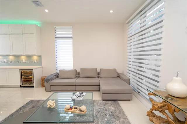 a kitchen with a sink a stove and refrigerator
