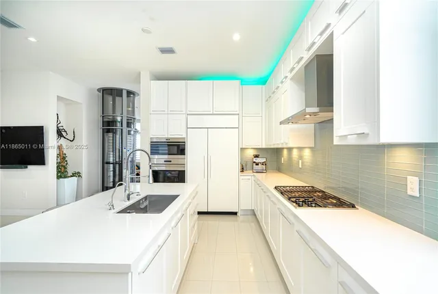 a bathroom with a bathtub and a sink