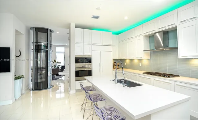 a bedroom with a bed and a cabinets