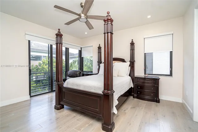 a bedroom with a bed and a chair