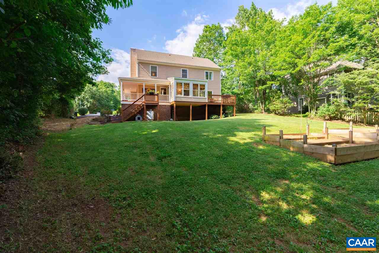 329 Starcrest Road Charlottesville, VA 22902 - Photo 3 of 45 a house view with a garden space