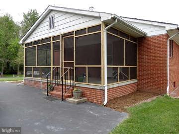 5840 Stephen Reid Road Huntingtown, MD 20639 - Photo 4 of 30 Newly-Screen Side Porch