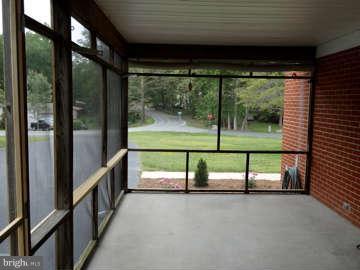 5840 Stephen Reid Road Huntingtown, MD 20639 - Photo 5 of 30 Large Screened Porch