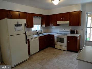 5840 Stephen Reid Road Huntingtown, MD 20639 - Photo 6 of 30 Abundant Kitchen with NEW flooring & appliances