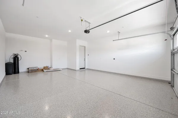 a view of a house with backyard porch and sitting area