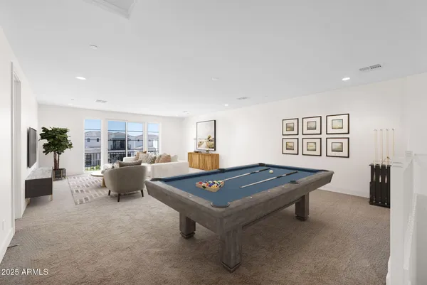 an aerial view of residential houses and outdoor space