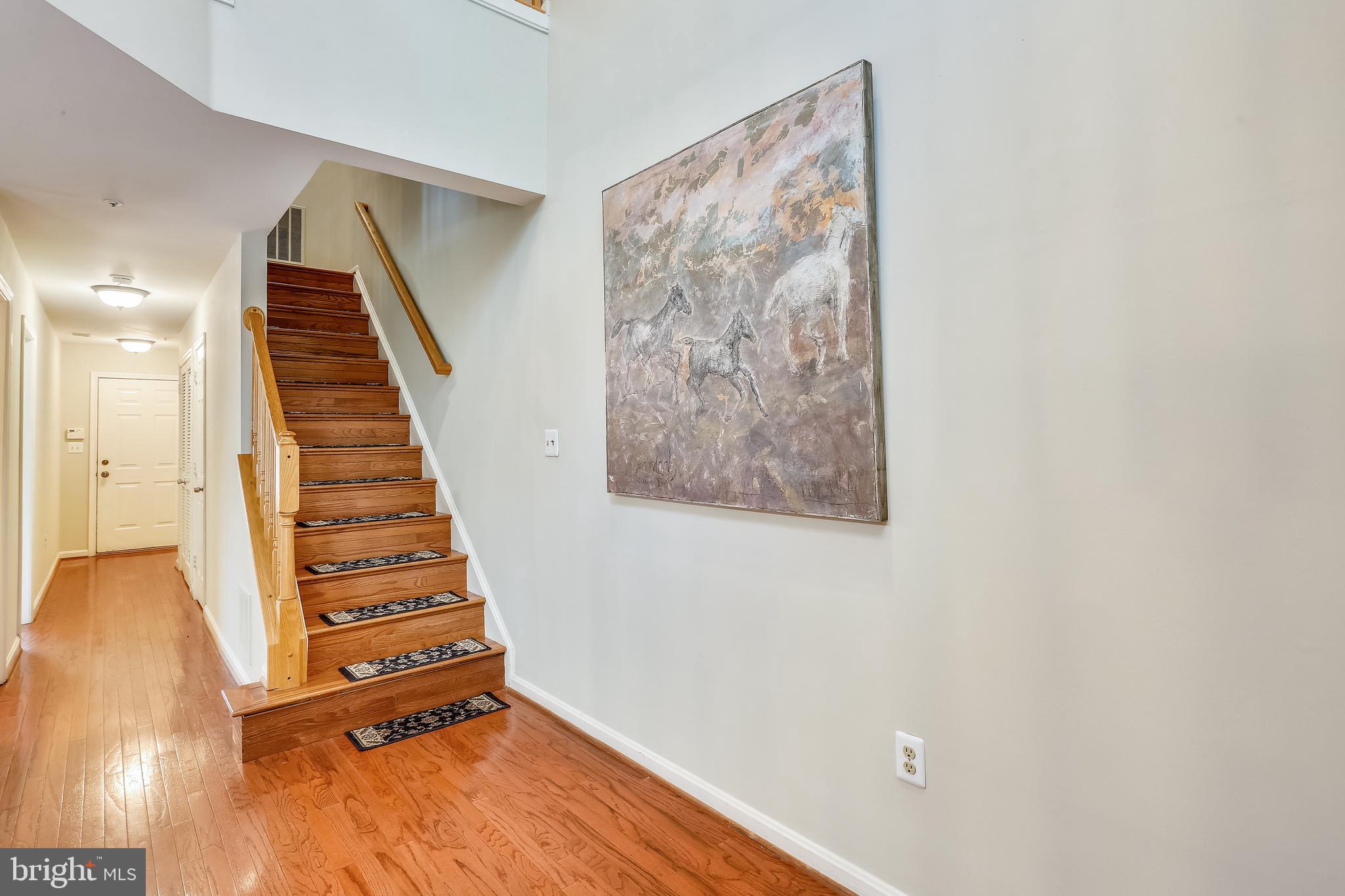 215 Ridgepoint Place Gaithersburg, MD 20878 - Photo 17 of 43 Entry foyer with hardwood floors