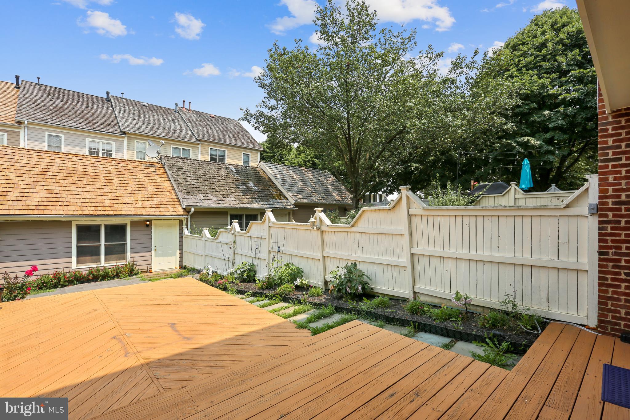 215 Ridgepoint Place Gaithersburg, MD 20878 - Photo 31 of 43 Backyard with deck and detached garage