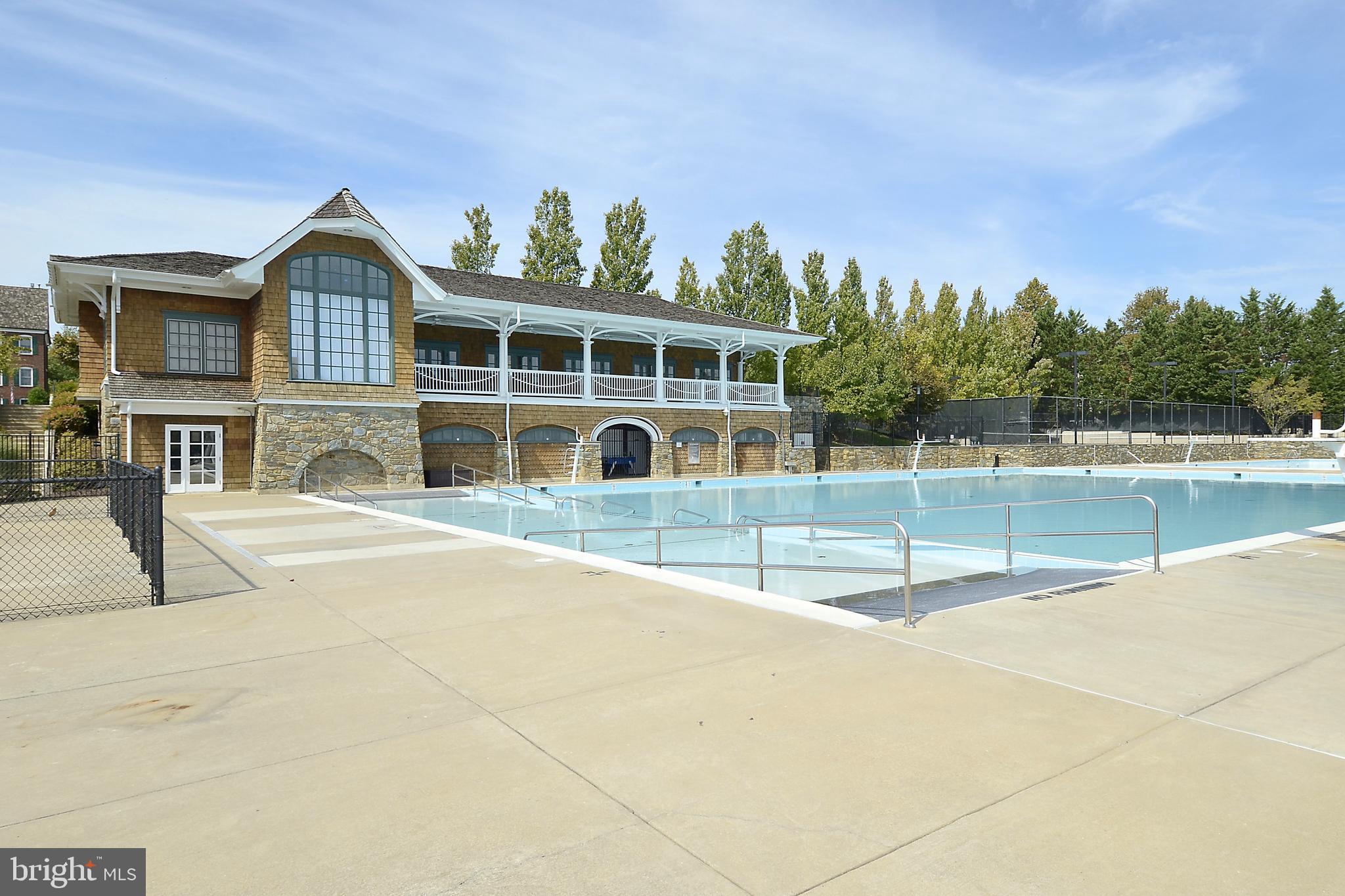 215 Ridgepoint Place Gaithersburg, MD 20878 - Photo 33 of 43 Kentlands social pool and clubhouse