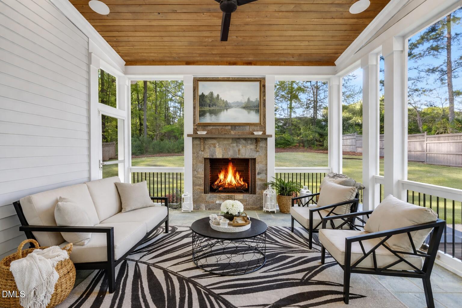 3419 Edgemont Drive Raleigh, NC 27612 - Photo 35 of 41 Cozy porch with stone fireplace