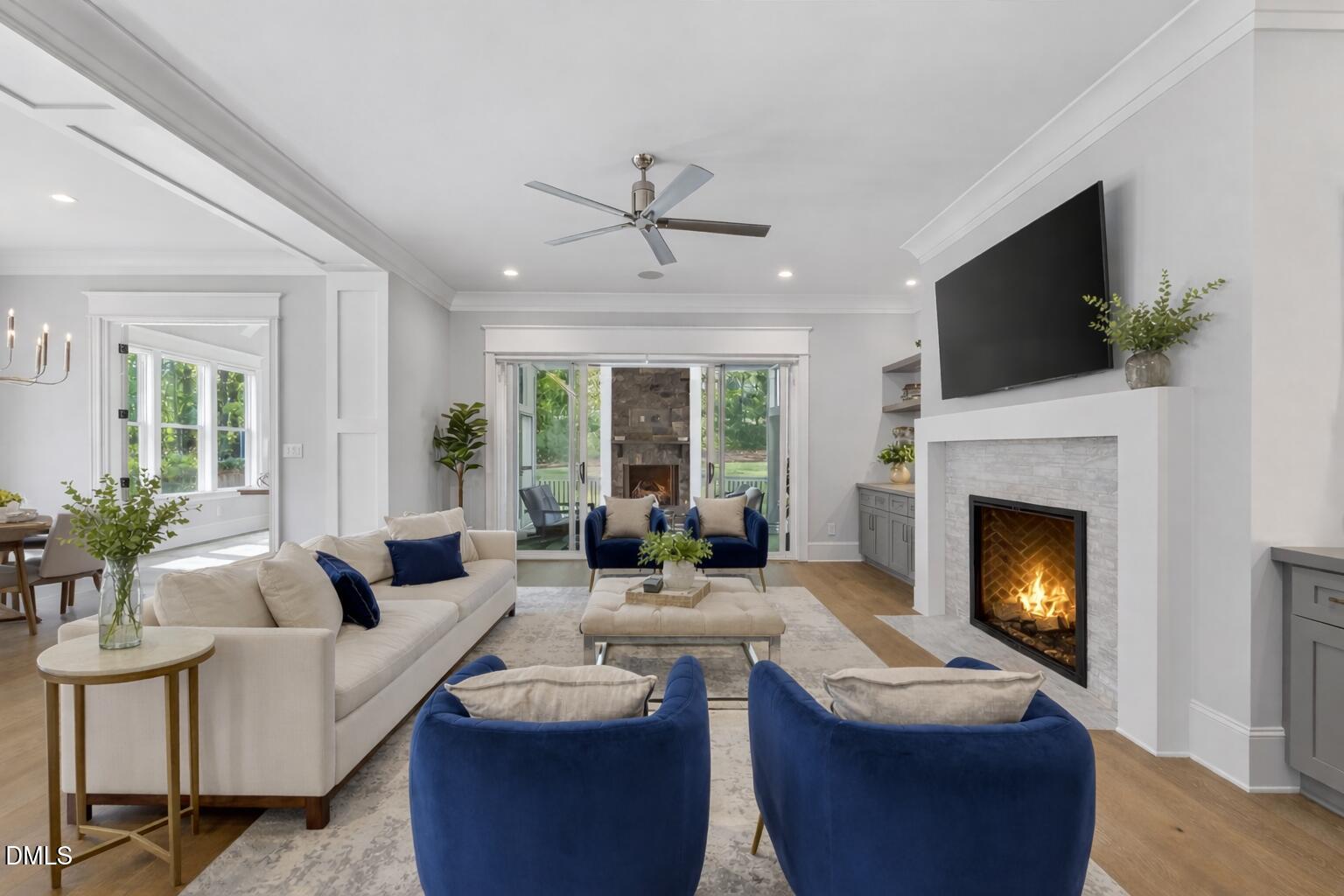 3419 Edgemont Drive Raleigh, NC 27612 - Photo 5 of 41 Modern living room with fireplace and gr