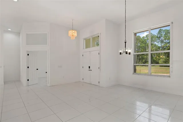 a room that has a glass door and glass door