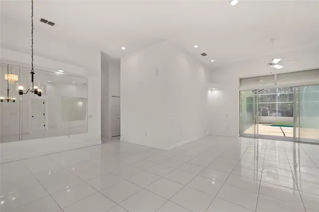 a kitchen with a refrigerator and a stove