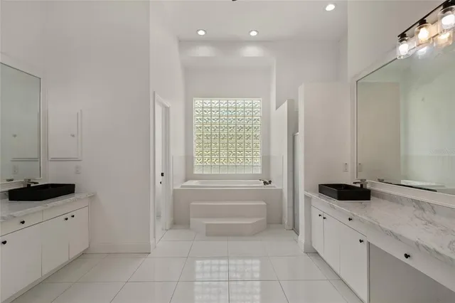 a wooden fence with trees in the background