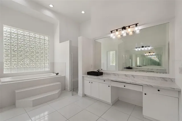 a view of a swimming pool with a yard