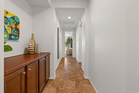 an aerial view of residential houses and outdoor space