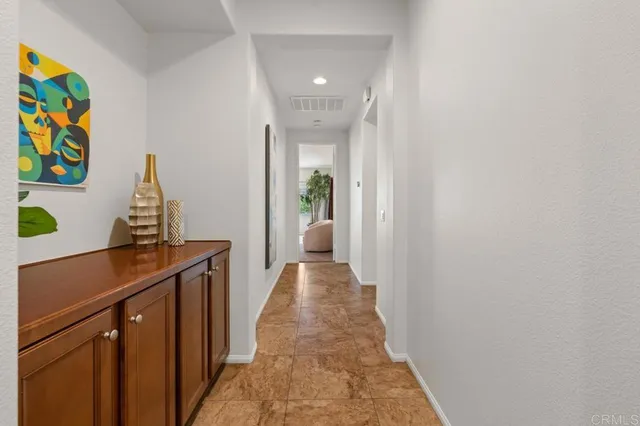 an aerial view of residential houses and outdoor space
