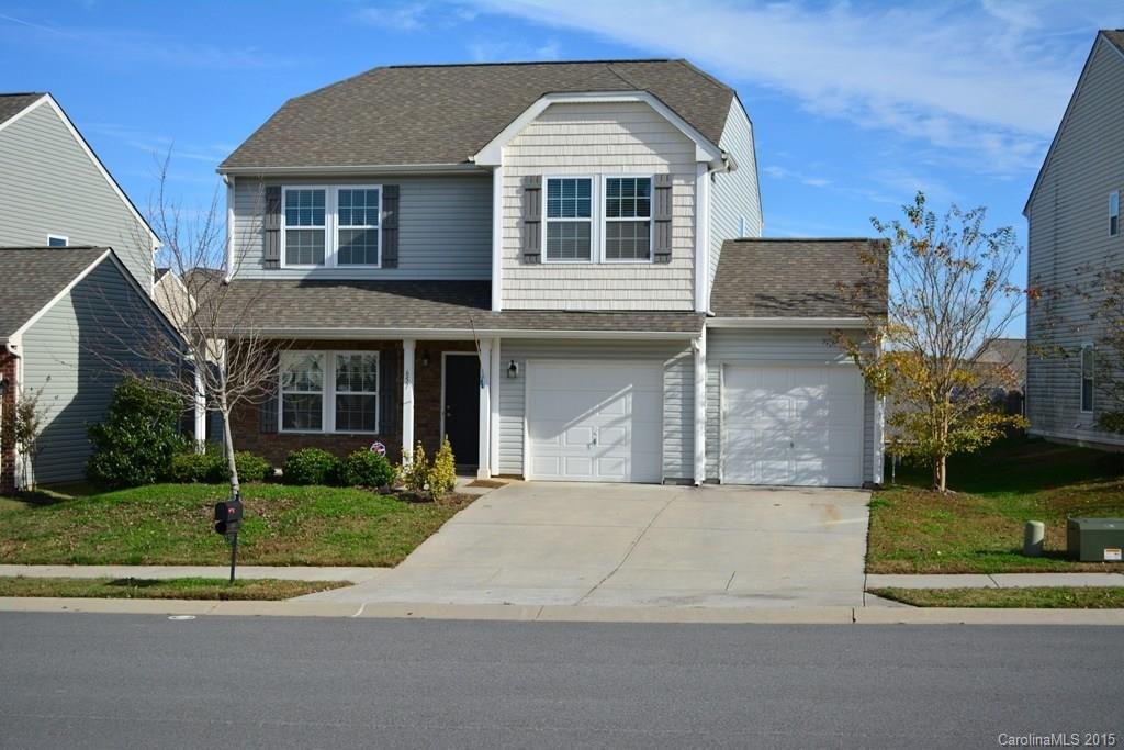 657 Shellbark Drive Concord, NC 28025 - Photo 2 of 24 a front view of a house with a yard