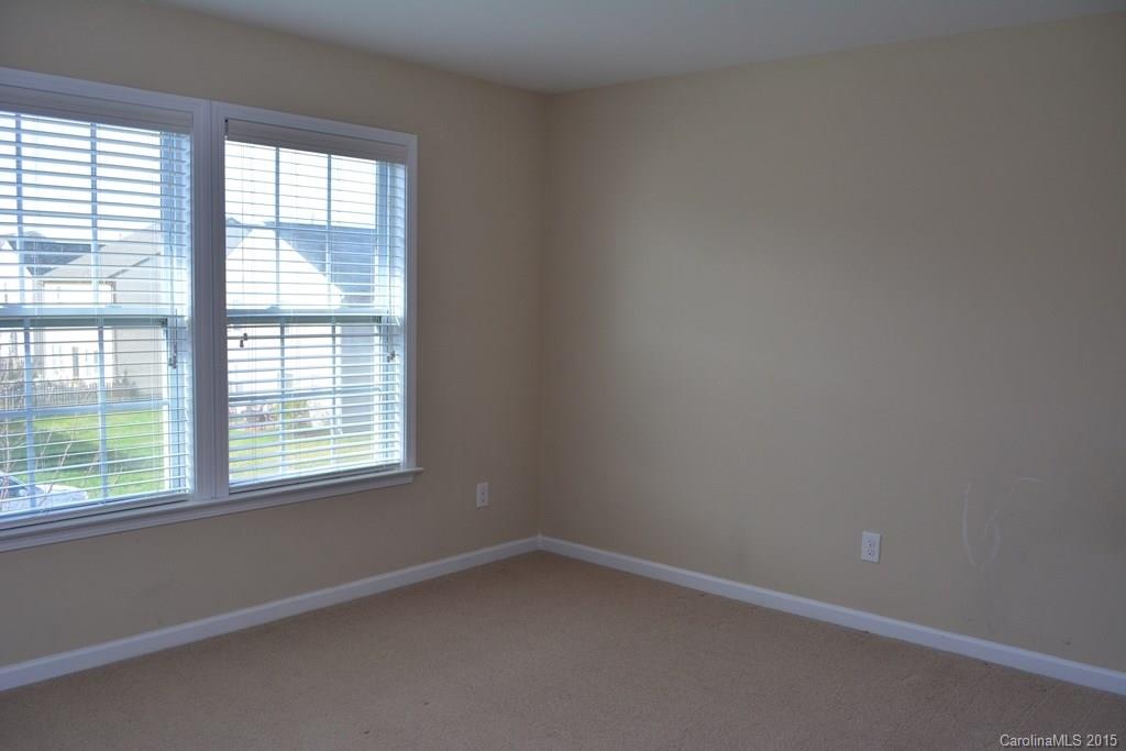 657 Shellbark Drive Concord, NC 28025 - Photo 17 of 24 an empty room with a window