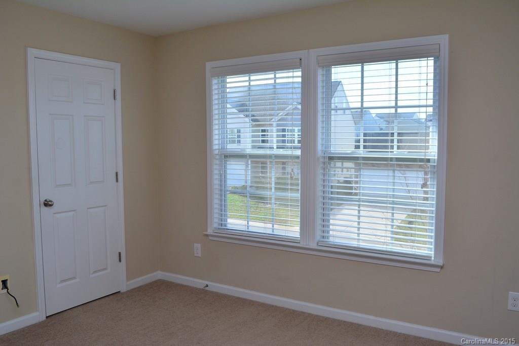 657 Shellbark Drive Concord, NC 28025 - Photo 18 of 24 a view of an empty room with a window